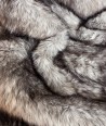 Feathery faux fur throws in gold and beige long haired fake fur