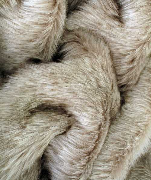 Long haired luxury beige fur bedspread