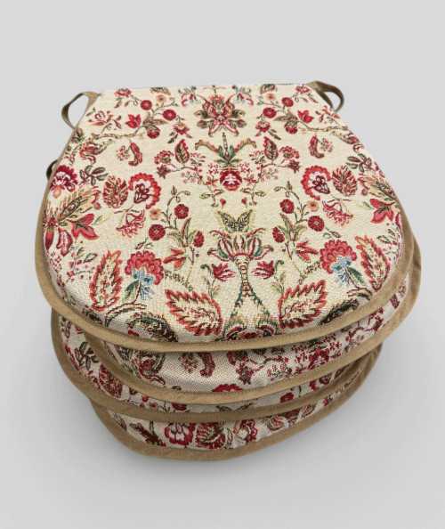 Classic D shaped seat pads in a traditional multicoloured print on a tapestry fabric