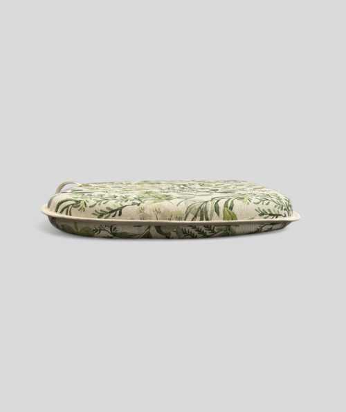 Spindle shaped chair pads with a modern green foliage print