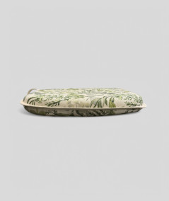 Spindle shaped chair pads with a modern green foliage print