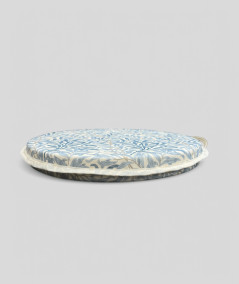 White and blue patterned round chair pads