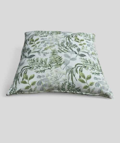 Square printed sofa cushions with green flowers