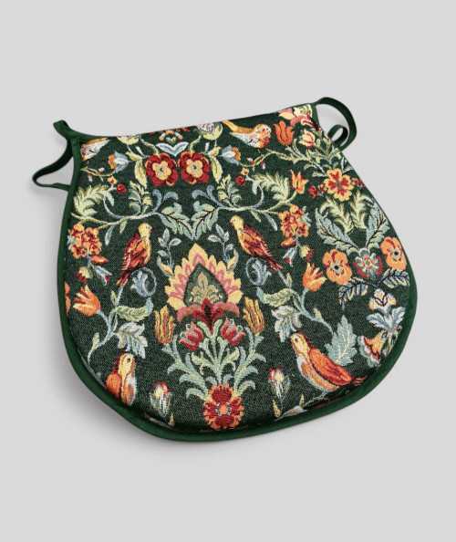 Classic D shaped chair pads in a dark green tapestry fabric
