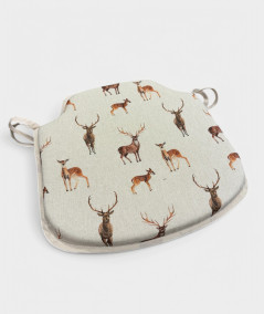 Beige spindle seat pads with a stag and deer design