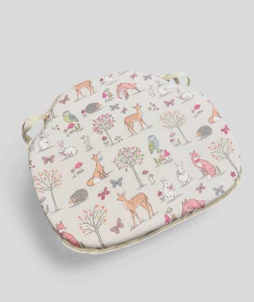 Extra thick spindle seat cushions with a woodland animal print