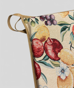 Multi-coloured tapered seat pads in a modern fruit design on a beige base