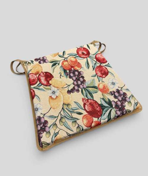 Multi-coloured tapered chair pads in a modern fruit design on a beige base