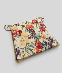 Multi-coloured tapered chair pads in a modern fruit design on a beige base