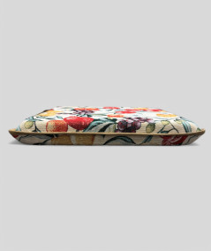 Multi-coloured square seat pads with a modern fruit design on a rich beige tapestry base