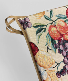Multi-coloured square chair cushions with a modern fruit design on a rich beige tapestry base