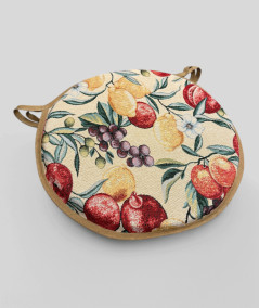 Multicoloured round bistro tapestry seat pads with a modern fruit design on a beige base