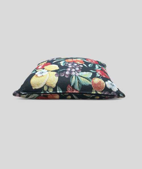 Square sofa cushions in a hardwearing tapestry type fabric with a multicoloured fruit design on a black base