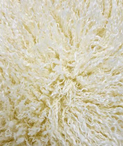 Long-haired cream, curly faux fur fabric