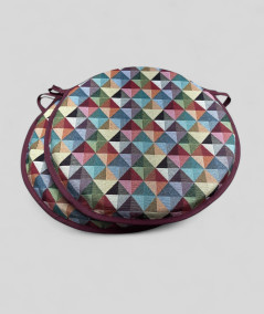 Multicoloured round shaped bistro chair pads in a modern geometric diamond pattern