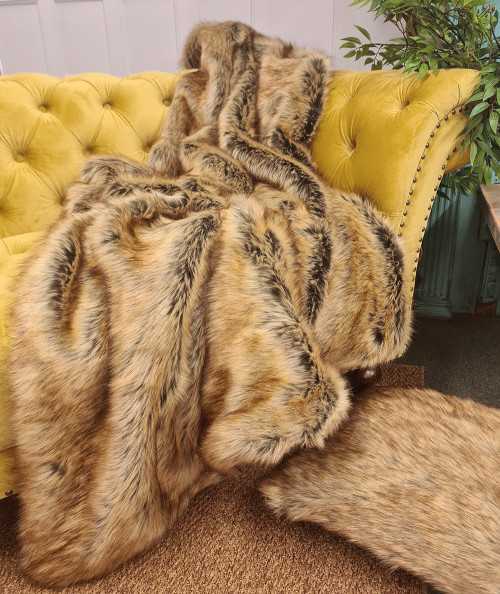 Luxury long-haired beige and brown faux fur blanket