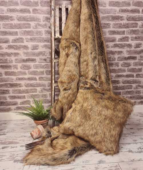 Luxury long-haired beige and brown faux fur bedspread