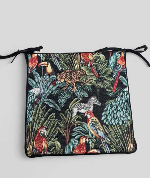 Multi-coloured square chair pads with a modern rainforest design on a rich black tapestry base