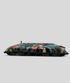 Multi-coloured square chair cushions with a modern rainforest design on a rich black tapestry base