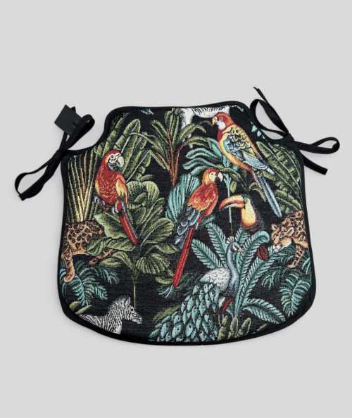 Spindle shaped chair pads in a black tapestry fabric with a bold multicoloured rainforest print