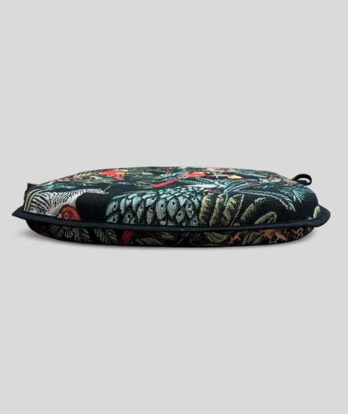 Spindle shaped seat pads in a black tapestry fabric with a bold multicoloured rainforest print