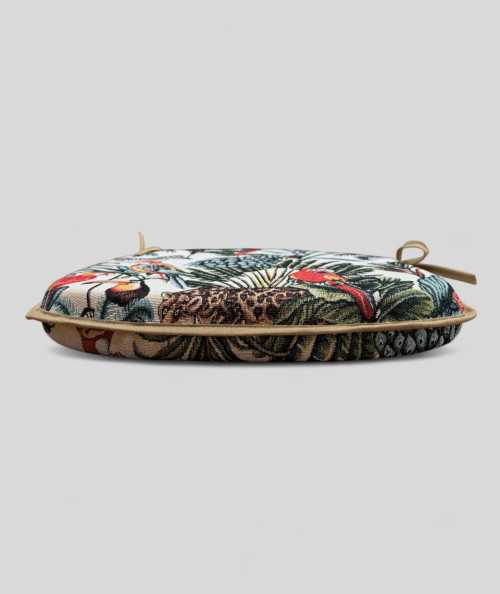Spindle shaped seat pads in a natural tapestry fabric with a bold multicoloured rainforest print