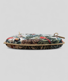 Spindle shaped seat pads in a natural tapestry fabric with a bold multicoloured rainforest print
