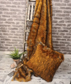 Long haired ginger faux fur bedspread