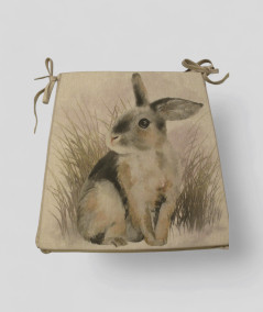 Duel design chair pads with a large rabbit and small ones