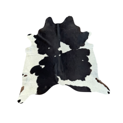 Tapis extra large en peau de vache noire et blanc cassé | Tapis en peau à poils très large
